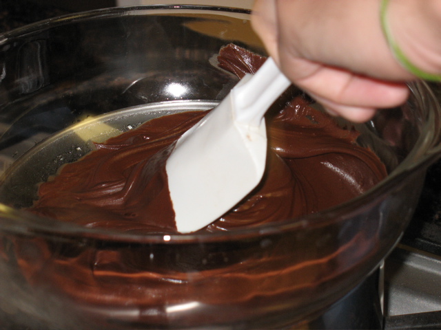 Daniel mixes chocolate