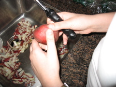 Shosh peels a potato