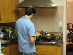 Daniel does something with the pans