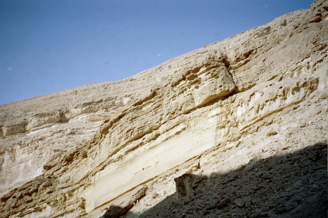 Sun rays hit the rock walls