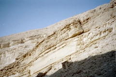Sun rays hit the rock walls