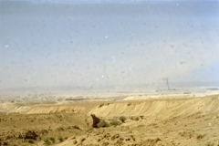 A factory pollutes the desert air