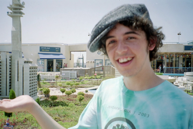 Nathan holds a large building