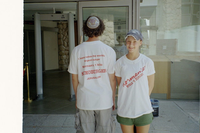Nathan and Jordana pose with Norman's shirts