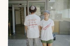 Nathan and Jordana pose with Norman's shirts
