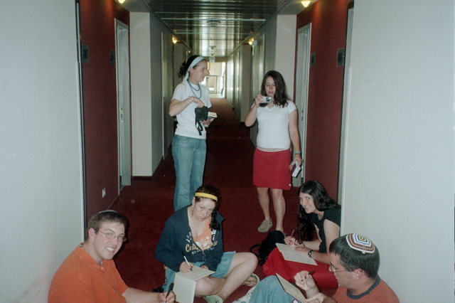 Steven, Leah, Rachel S, Francie, Lia, Benji writing in Staff gifts