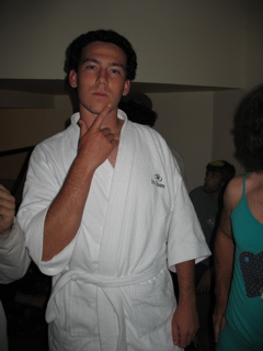 David is wearing a bathrobe