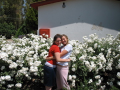 Jenni and Molly among the huge white roses