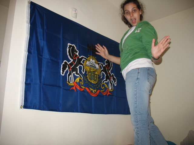 Shoshana sets up Andy's Pennsylvania Flag