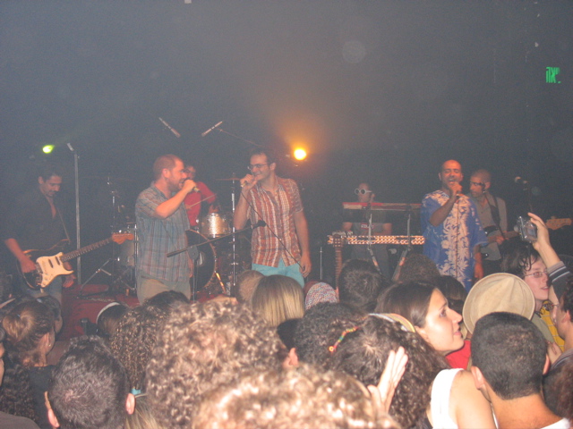 The band, singing.