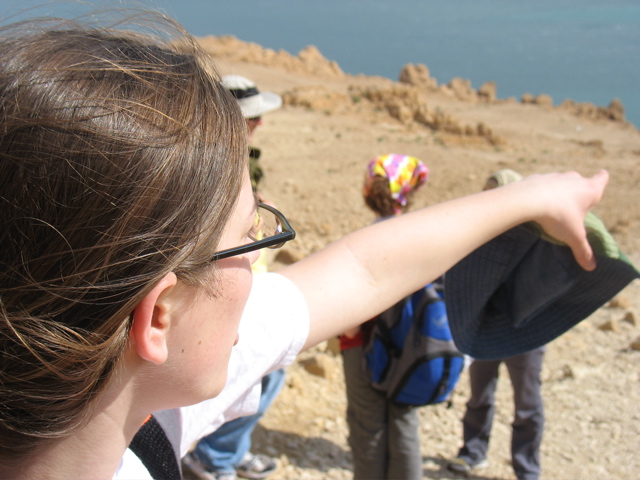 Abi points at the mud