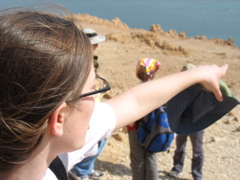 Abi points at the mud