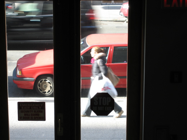 A woman after Shopping; an SUV
