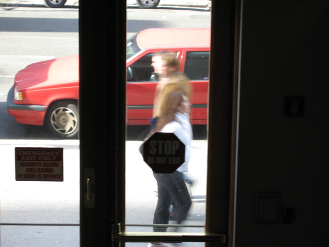 A woman passes a man