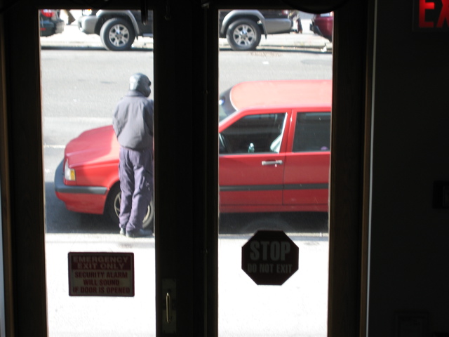 The policeman is still at the car