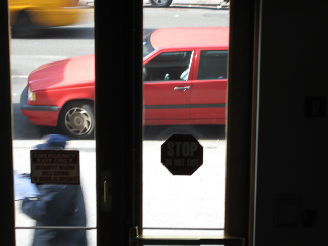 A man in a cap; a cab