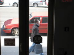 A couple, with bags (Abercrombie & Fitch)