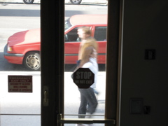 A woman passes a man