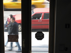 A man with glasses and a woman; a cab