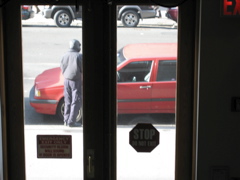 The policeman is still at the car