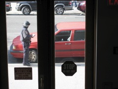 Policeman writes a parking ticket