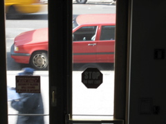 A man in a cap; a cab